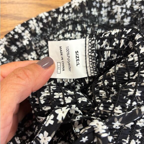 Floral Black and White Women's Jumpsuit with Flared Ruffled Legs - Picture 5 of 5